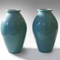 Pair of Galloway Glazed Urns with Excellent Verdigris Patina (SOLD)